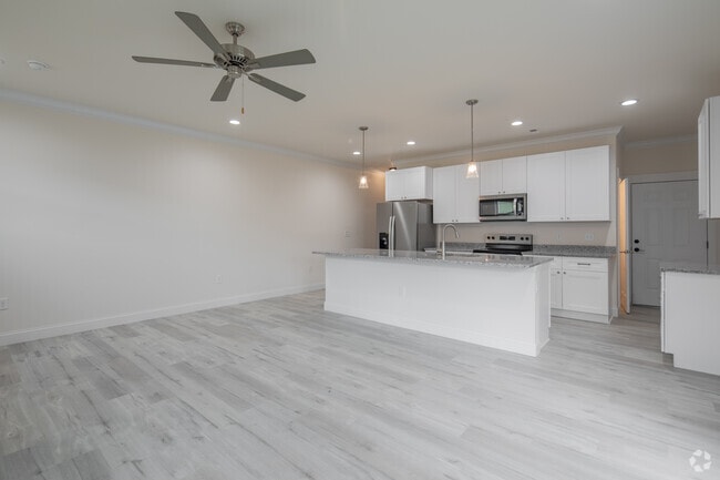 3BR, 2.5BA - 1,512SF - Living Room - The Arbors