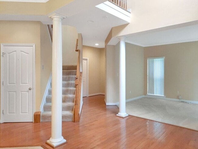 Photo - Single Family Home with 2 Car Garage Deck ...