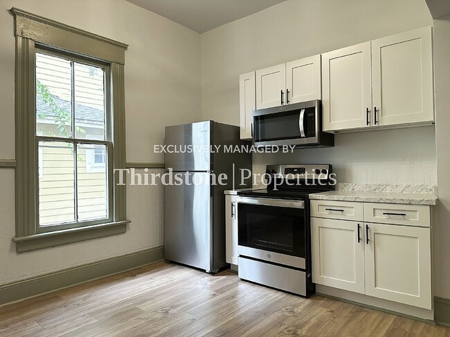 Photo - 210 E 9th St