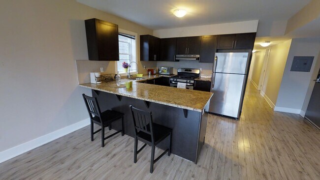 Photo - 4-Bedroom Basement Apartment Near Carleton University - All inclusive and Fully Furnished Unit 1