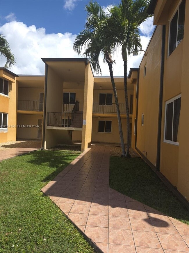 Building Photo - 8990 SW 24th St Unit 19