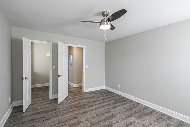 Extra large bedrooms with grey composite floors