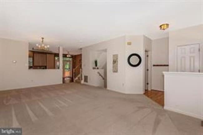 Photo - WELL MAINTAINED TOWNHOUSE WITH ONE CAR GARAGE, DECK,