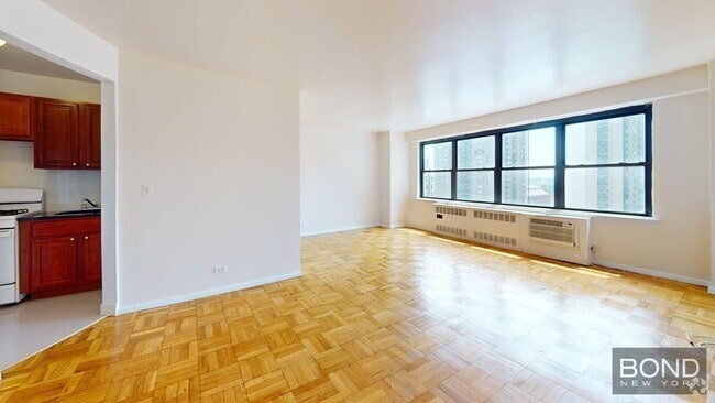 Building Photo - 399 E 72nd St Unit 16J Rental