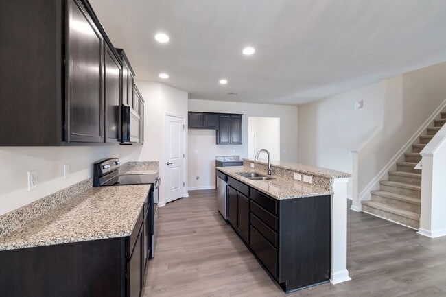 Photo - Move-In Ready Highland Creek Beauty! 4BR + Office + Den + Loft | Private Pond View & Top Communit...