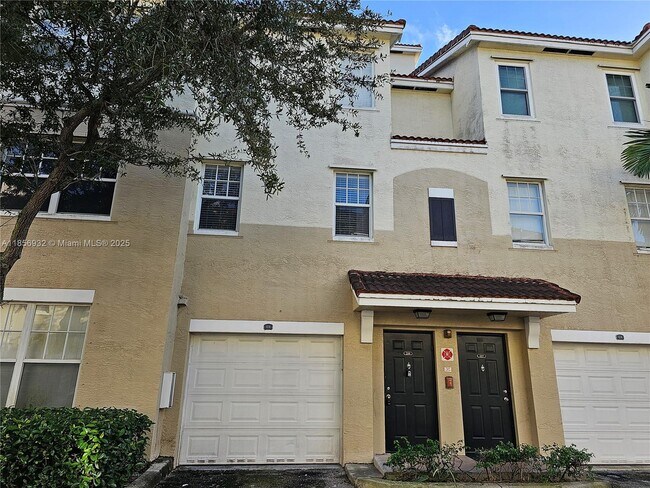 Building Photo - 5800 W Sample Rd Unit 206 Rental