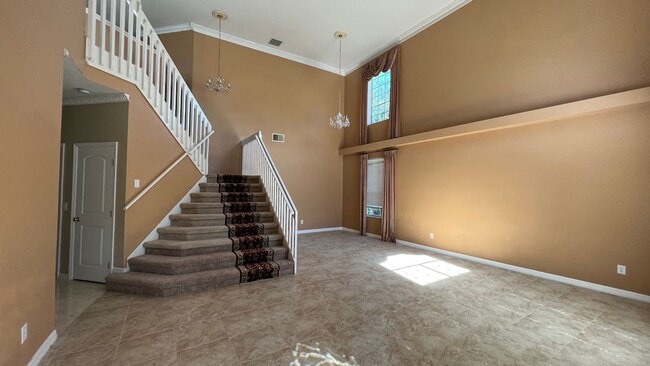 Photo - Spacious 4/3.5 Pool Home with Water View & 3-Car Garage in Lee Vista Area (close to Lake Nona)