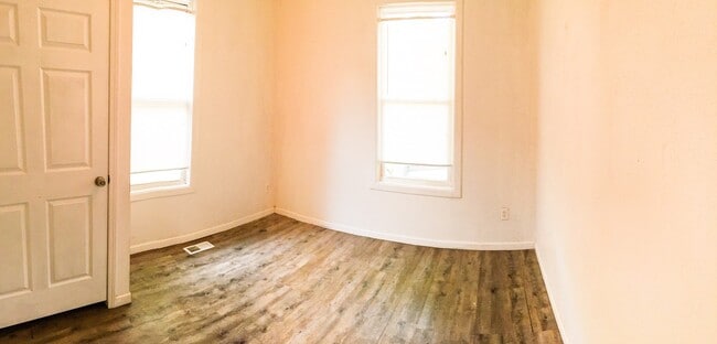 Building Photo - 2BR/1BA Single Family House with basement work-space and big yard!