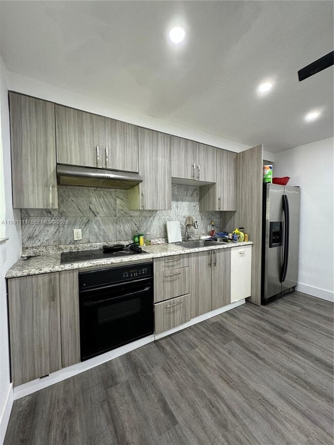 Building Photo - 1086 NW 110th St Unit 1