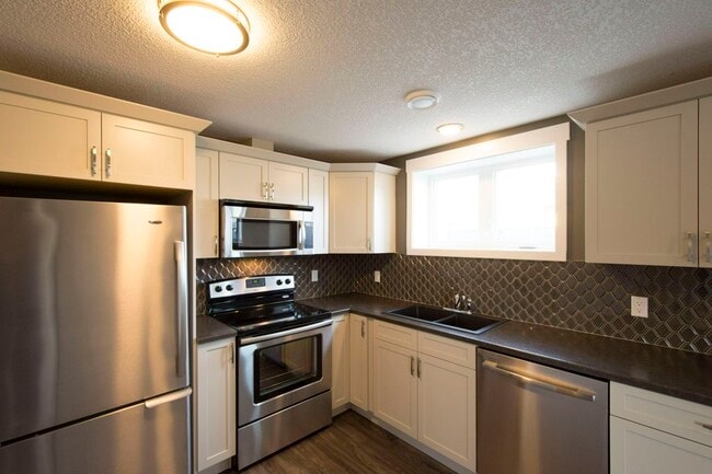 Photo - 10103-102 102 Ave Unit 104 - O