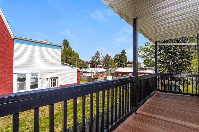 Photo - Bright & Fully Renovated 3BR Home with Backyard, Bonus Attic Space & Modern Upgrades
