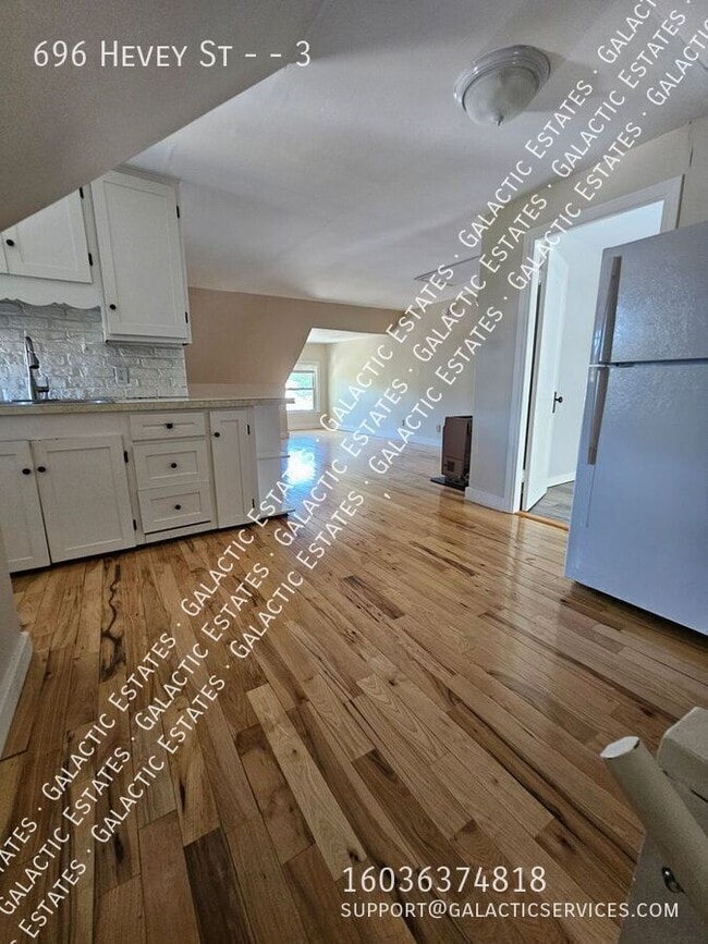 Building Photo - 696 Hevey St Unit 3