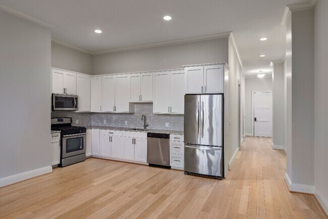 Designer kitchens feature custom cabinetry & first-class finishes