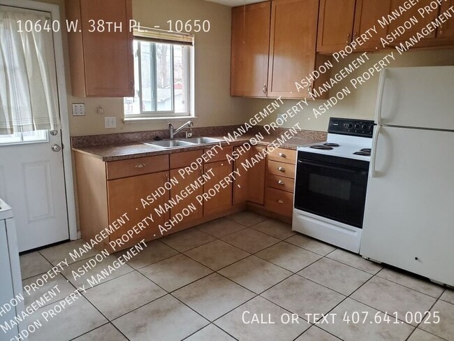 Building Photo - 10640 W 38th Pl Unit 10650 Rental
