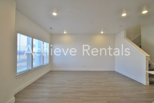 Photo - Woodmore Pointe HOA | Modern Logan Townhome in Prime Location