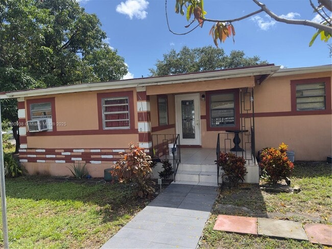 Building Photo - 2490 NW 97th St Unit A Rental