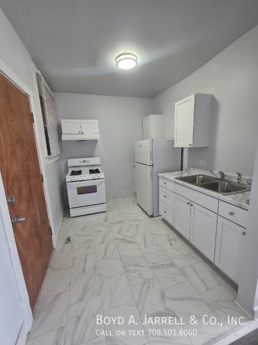 Photo - 10855 S Vernon Ave Unit 109 55-2W