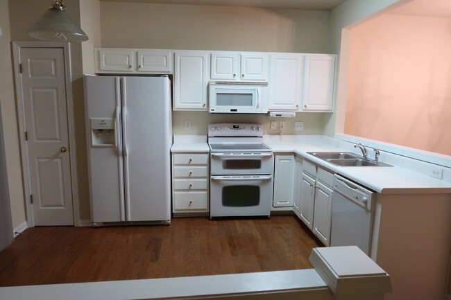 kitchen view from Family room - 200 Durston Loop