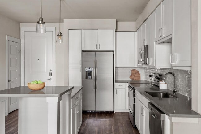 A kitchen island doubles the counter for prep, plating and cleanup.
