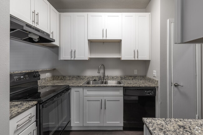 2BR, 1BA - 874SF - Kitchen - Oaks of North Dallas Apartments