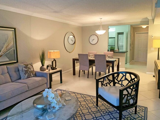 1BR, 1BA - 963SF - Living Room - Turnbury at Palm Beach Gardens Apartments