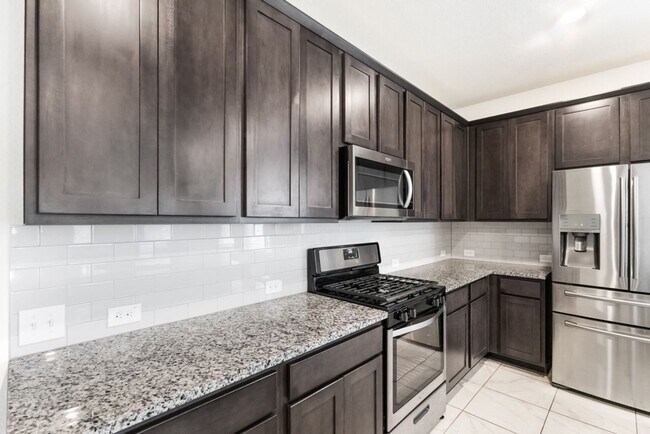 Photo - A rare true dual-suite floorplan in Alamo Ranch — two private en-suite bedrooms, single-story liv...