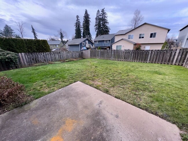 Photo - Spacious 4BR Home with Fenced Yard, 2-Car Garage & Convenient Location