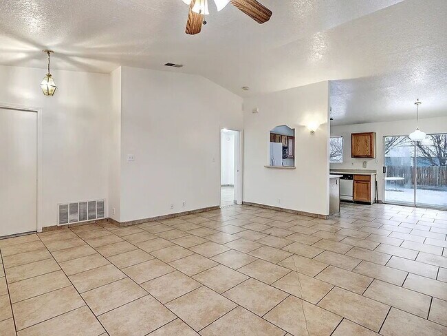 Photo - "Spacious 4-Bedroom Gem on Quartz Dr – Your Ideal Albuquerque Retreat!"