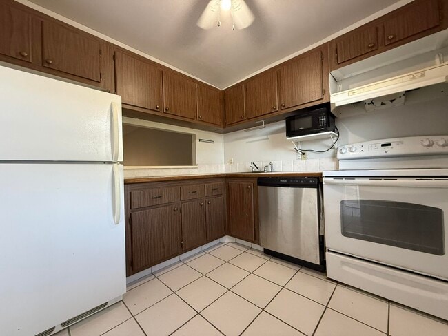 Building Photo - 12009 Poinciana Blvd Unit 204