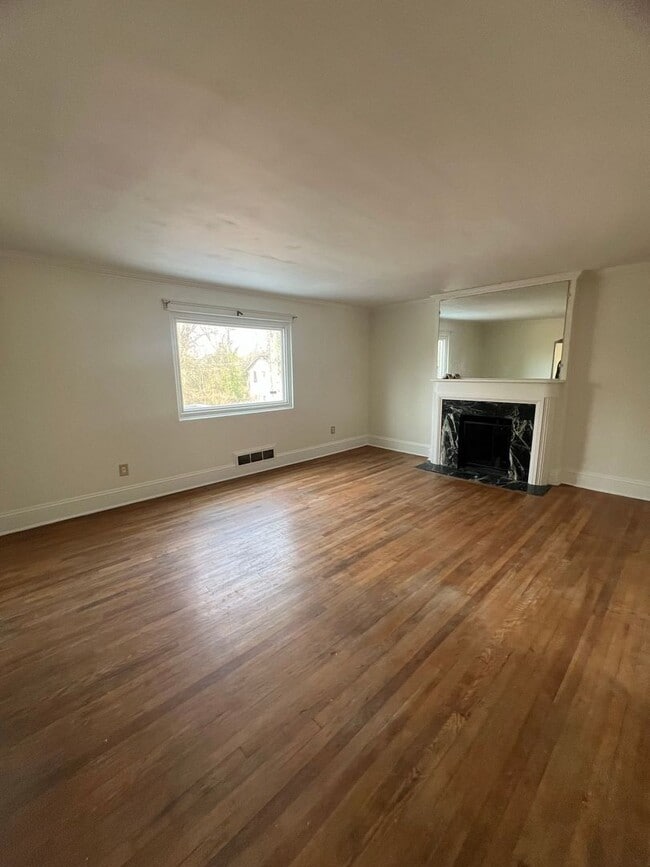 Photo - Spacious 4-Bedroom Brick Home with Hardwood Floors and Walk-In Closet