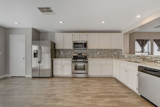 Photo - Totally Updated Solar Powered 4 Bedroom! Bedroom and Bath Downstairs!