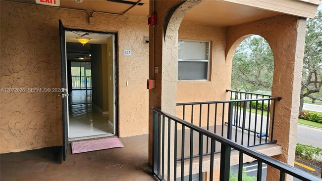 Building Photo - 2700 Coral Springs Dr Unit 314