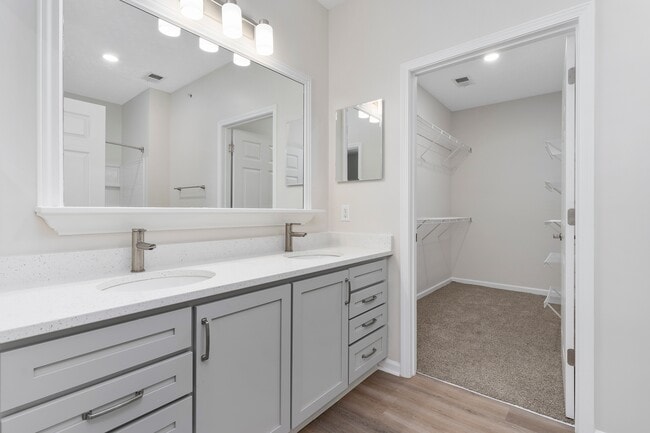 The Charleston Magnolia Premium Renovated Large Bathroom vanity with drawers, picture frame mirror, quartz countertop, brushed nickel fixtures