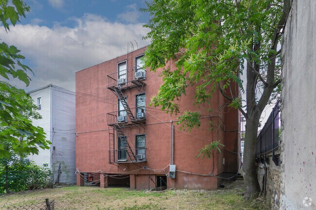 Rear of Building with Fire Escape - 160 Palisade Ave
