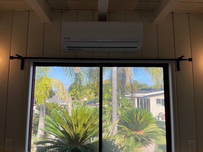 Split ac unit, above sliding door to the inviting backyard - 1947 Caddington Dr
