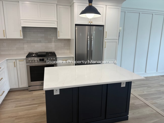 Photo - Fully Redesigned Townhouse Style Condo For Rent in Desirable Louisquisset Community!