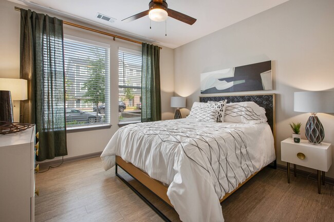 Bedroom with Large Window - Vesta City Park Apartments