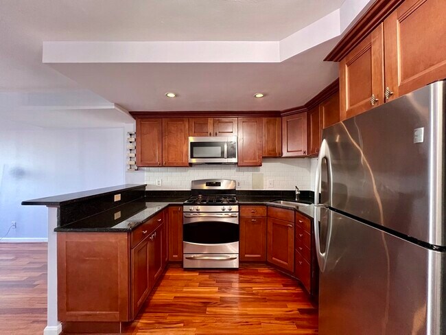 Building Photo - 1245 13th St NW Unit 900