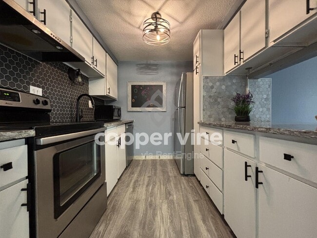 Building Photo - 12168 N Melody Dr Unit 104