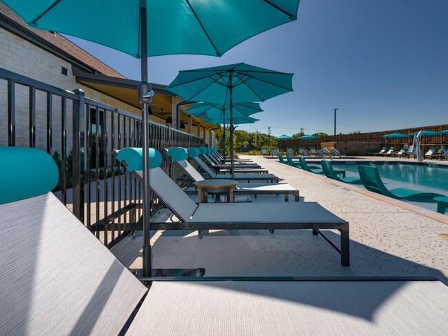 lounge chairs near resort-style pool