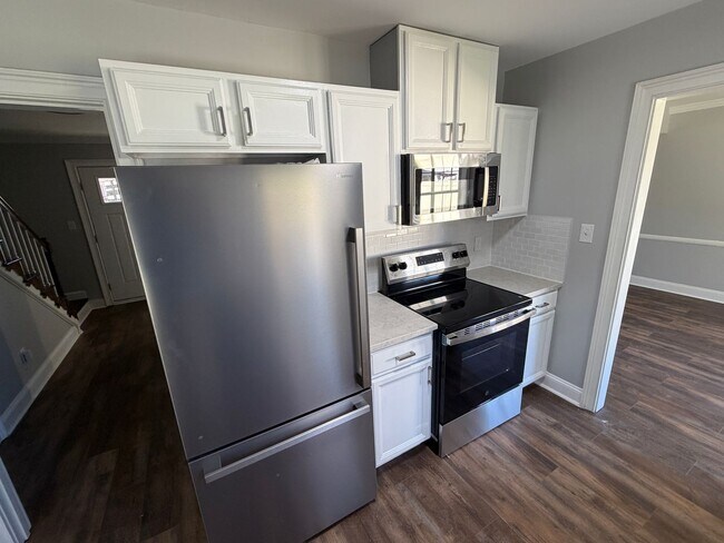 Photo - Remodeled bathrooms, new kitchen in this N...