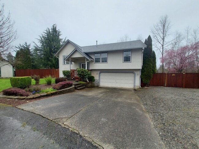 Photo - 4 bedroom 2.75 bath, Huge Fenced Yard with Landscaping Included!!