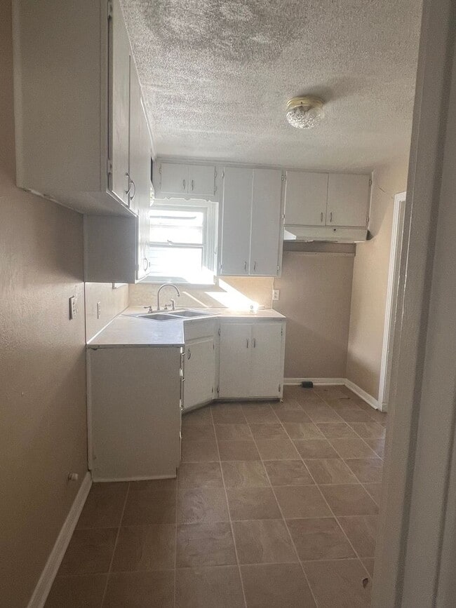 Photo - Two Storage or Bonus Spaces