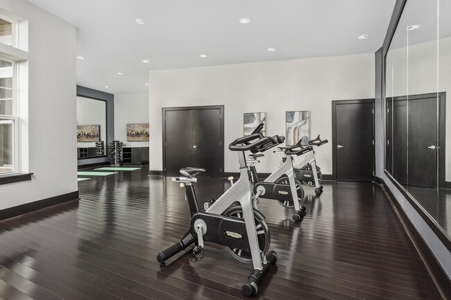 Fully-Equipped Fitness Center with Highly-Specialized Technogym Cardio Machines, Free Weights, Spin Bikes, and Individual Strength Training Machines