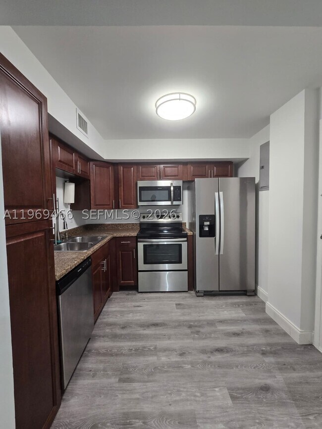 Building Photo - 6500 Cypress Rd Unit 301