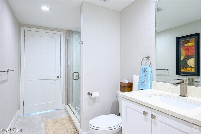 Building Photo - 7117 Pelican Bay Blvd Unit 1001 Rental
