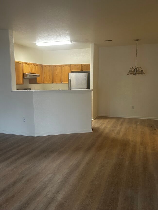 Kitchen / Dining area - 7454 S Alkire St Unit 103