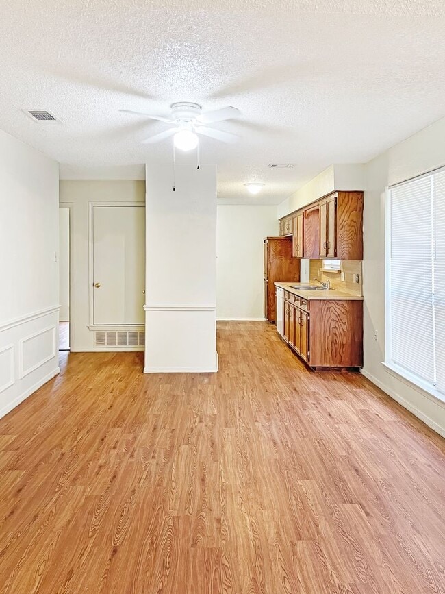 Photo - Spacious 3-Bedroom Duplex with Covered Parking & Fenced Yard!