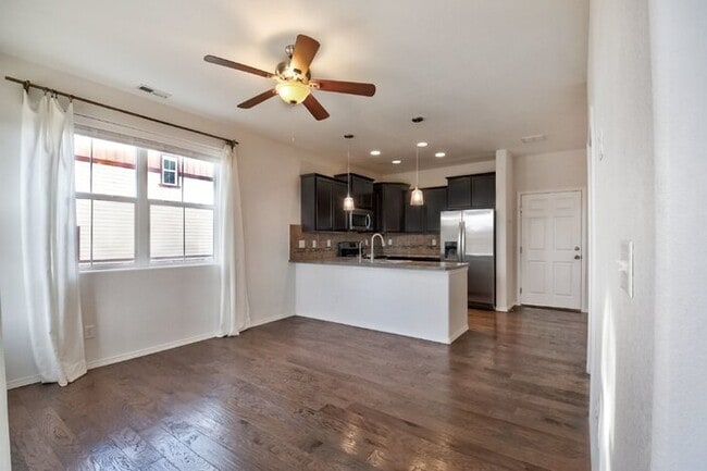 Photo - Immaculate 3-Bedroom Townhome with Stainless Steel Appliances and Attached Garage Near Peterson SFB