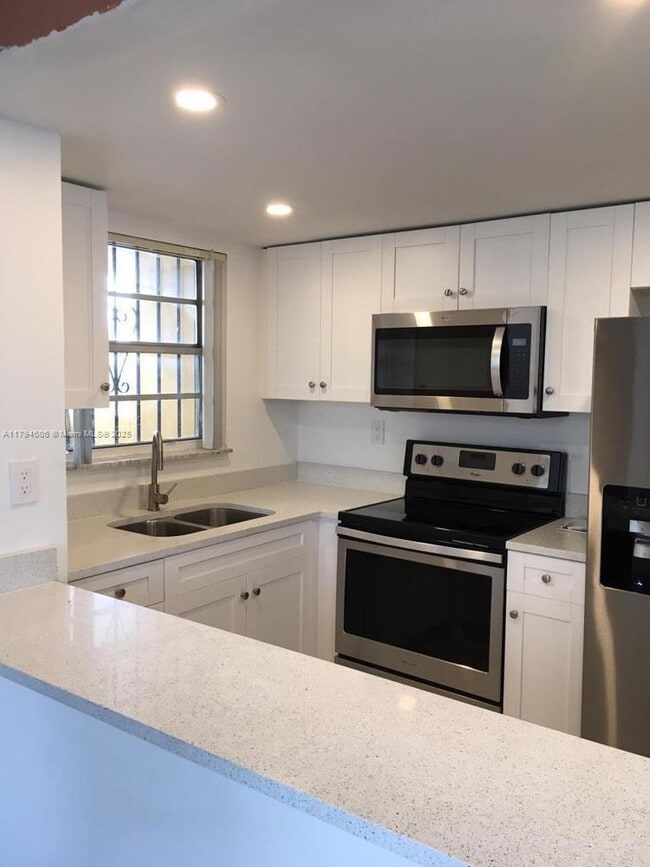 Building Photo - 8897 Fontainebleau Blvd Unit 311-311 Rental